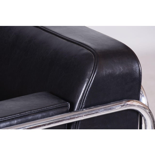 This iconic sofa from the 1930s is an exceptional example of Bauhaus design, crafted in Czechoslovakia by the renowned...