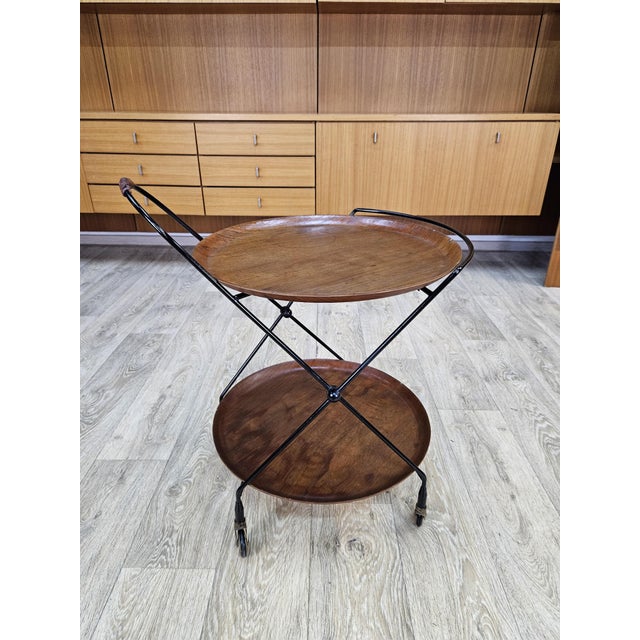 The subject of the auction is a bar cart designed by Åry Fanérprodukter for Nybro in the 1960s. The original condition...