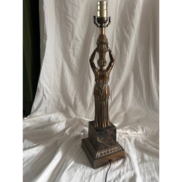 Vintage 1970’s Alsy figural table lamp. Neoclassical style featuring a Grecian motif. Brass construction. Harp and shade...