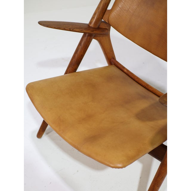 CH28 Lounge Chair in Oak and Cognac Leather by Hans J. Wegner, Denmark, 1950s For Sale - Image 12 of 17