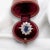 Vintage daisy ring (circa 1960) in 18 carat white gold (750 thousandths). It is adorned with a natural blue sapphire of...