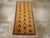 A vintage Turkish Anatolian Deco throw rug handmade during the Mid-20th century. Measures: 1' 10" x 4' 0"
