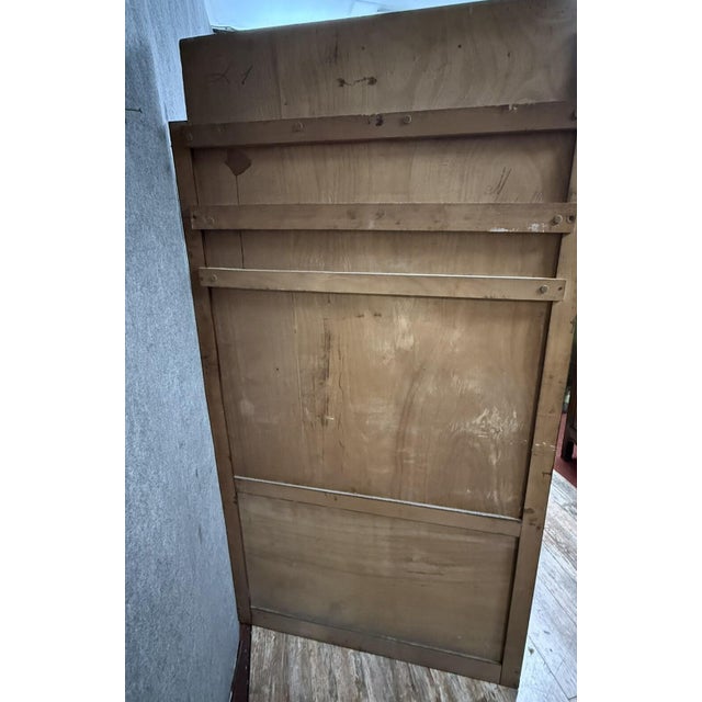 Art Deco coat and umbrella stand in patchwork of different woods decorated with a rectangular mirror at the top and six...