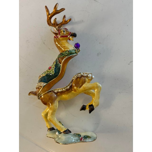 This handcrafted Sorelle enamel hinged reindeer box has beautiful details. Bright colors, rhinestone accents & magnetic...