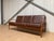 Grete Jalk sofa in teak and original brown leather, produced by France & Son / Daverkosen, Denmark, 1960s. Elegant Danish...