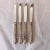 Vintage set of 4 silver-plate knives with floral design 8.90"L , Makers mark reads " 1881 Rogers Silver Plate" Flirtation...