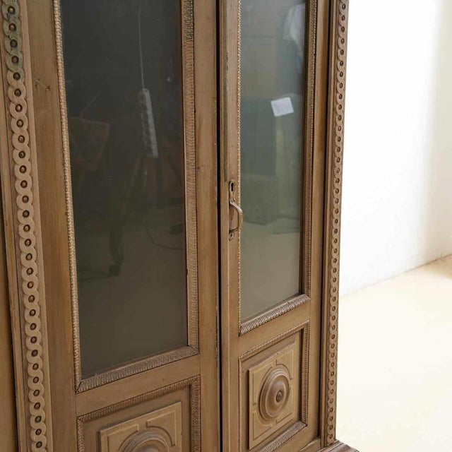 This charming vintage cabinet, dating back to the 19th century, is an extraordinary example of craftsmanship. Crafted from...