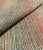 This modern woven fabric will add a pop of color to any room with a turquoise, pink, green, orange, off-white, and greige...