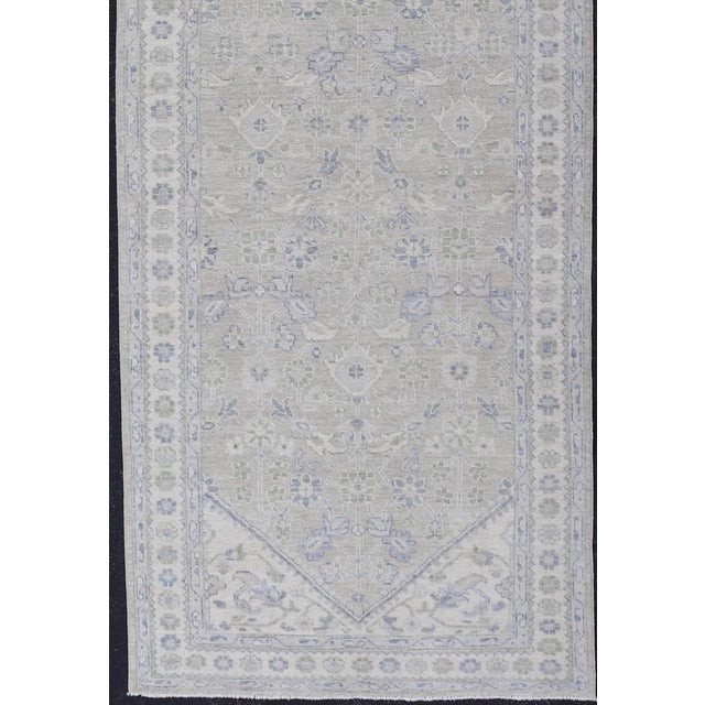 Measures: 4'2 x 13'8 Oushak Gallery Runner with Soft Gray Base and Subtle Blue and Sage 4'2 x 13'8. Keivan Woven Arts. rug...