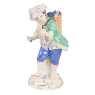 Early 20th Century Porcelain Figurine of Boy with Basket of Grapes from Meissen, Germany For Sale