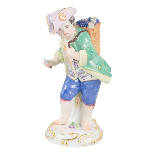 Early 20th Century Porcelain Figurine of Boy with Basket of Grapes from Meissen, Germany For Sale