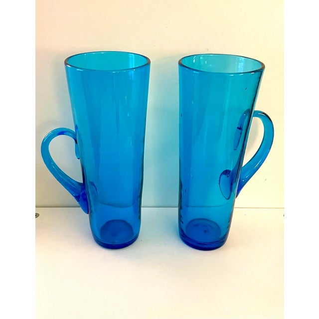 Set of 5 Blenko Chimney High Balls. These are the tallest high balls you’ll ever see. Hand blown they retain beautiful...