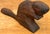 Crafted from a single block of wood, this vintage beaver sculpture captures the charming essence of woodland folk art...