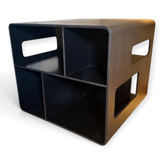 Arne Rotating Bookcase table by Antonio Citterio for B&B Italia. Crafted from bent wood with a dark espresso finish, the...