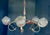 Stunning 1960s Japanese midcentury-modern 5-light brass and wood tulip chandelier with textured-glass shades. I believe...