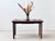 An elegant extendable dining table from the 1960s/70s with a timeless design language influenced by mid-century modern....