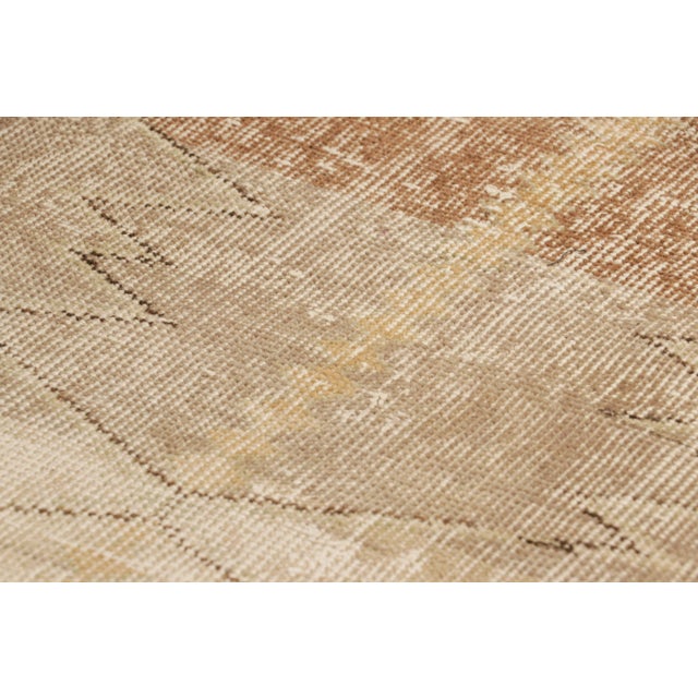 Hand-knotted in wool and originating from Turkey circa 1960 – 1970, this 2x4 vintage Zeki Müren rug is a unique addition...