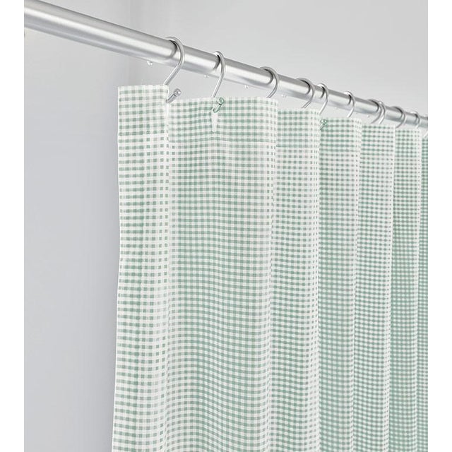 Embrace easy-going elegance. With Malaya, Alexa Hampton has elevated a cherished classic - checkered gingham - in eight...