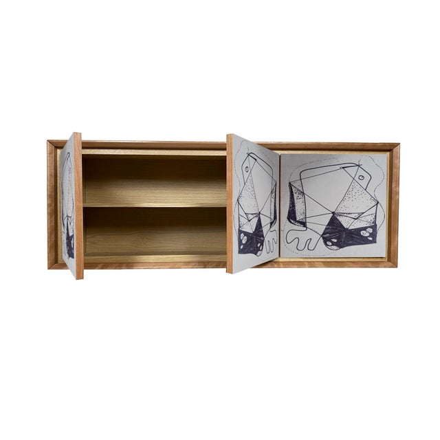 "Artistica Due" Sideboard 2026 by Meccani Studio for Meccani Design. A beautiful suspended sideboard in oak with cherry...