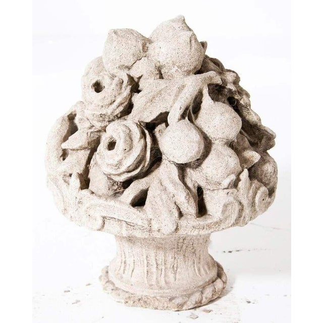 Late 19-century cast stone basket of fruit and flowers. France, circa 1890.