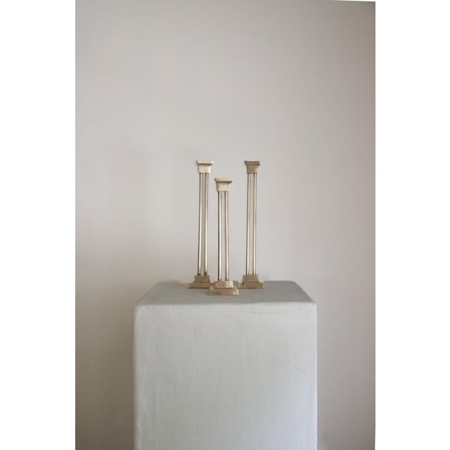 Set of 3 Vintage Brass Candlestick Holders Unfinished brass, they will tarnish. Photographed after polishing. Some dark...