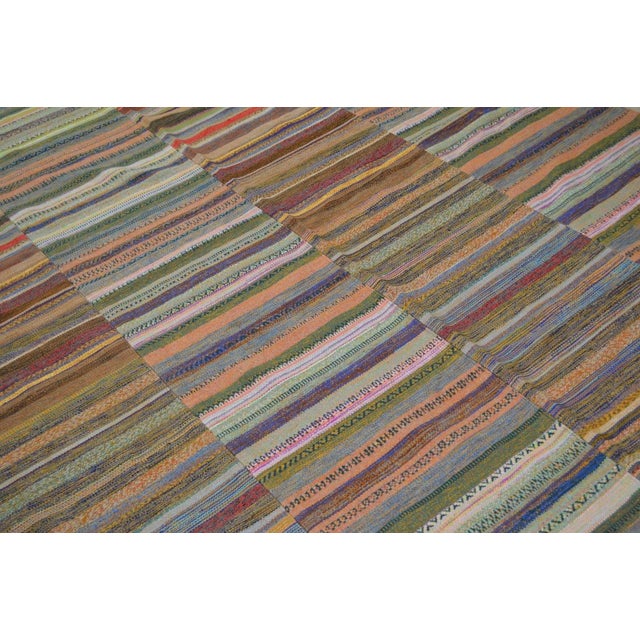 Flatweaved with care using traditional rug-making techniques, this wool rug blends timeless craftsmanship with a modern...