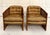 Here is a lovely pair of side chairs featuring solid wood frames with wonderful cane detailed sides. The chairs are...