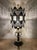 Striking vintage 1972 Hollywood Regency table lamp with an ornate pierced metal shade, faceted crystal-style accents,...