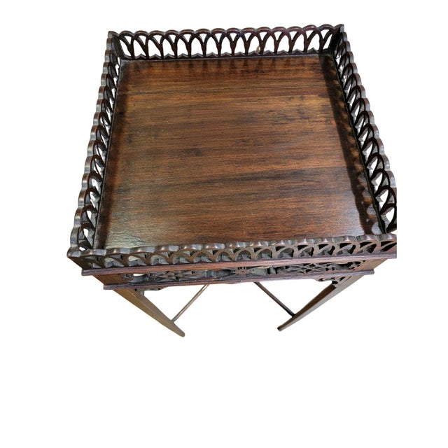A late 19th century pierced fretwork Chippendale Mahogany "Kettle" stand with fretwork gallery, aprons and corner...