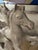 Large dramatic glazed terracotta sculpture of galloping horses, having glossy cream color. The details and powerful...