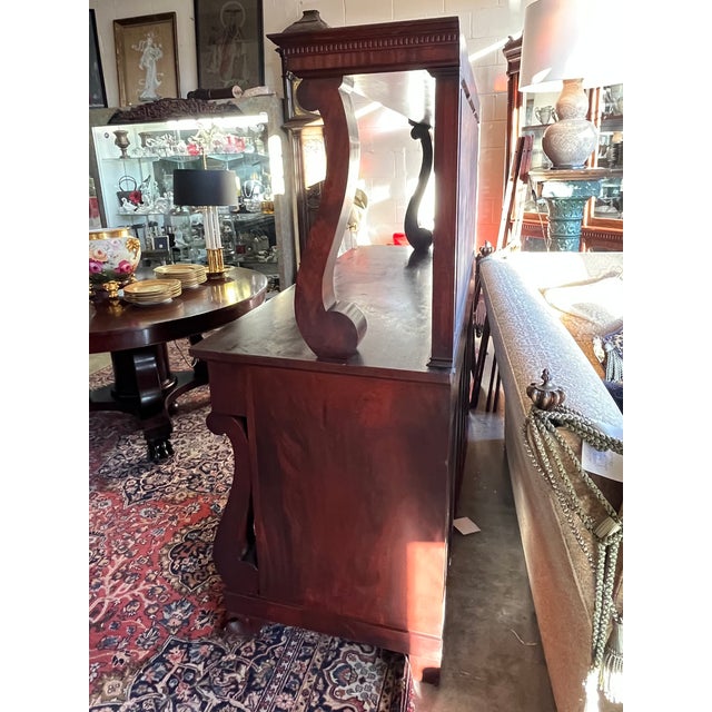 Beautiful Large 1880's Empire Mahogany Buffet with large claw feet. Beveled mirror, 6 drawers and 2 cabinets, Stunning...