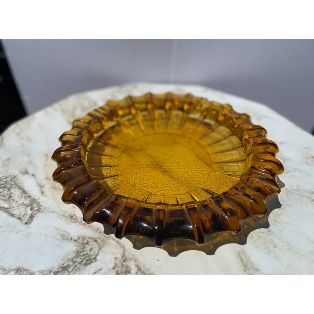Here we have a really nice large and handsome classic art-deco to mid-century golden amber ashtray in excellent condition....