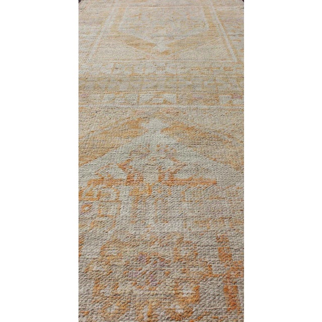 Mid 20th Century Vintage Turkish Oushak Runner With Medallion's in Light Blue, Cream, Light Orange For Sale - Image 5 of 13
