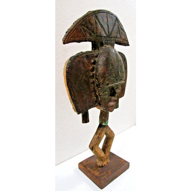 Antique Bakota Reliquary Kota Mask Figure Sculpture from the Tribe in Gabon Measures 11 3/4" wide, 6" deep and 23 1/2"...