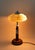 Unusual table lamp from the Art Deco period in Austria around 1930. An absolute extraordinary piece of lightning which...
