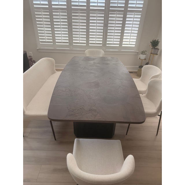 Beautiful Arhaus dining set in excellent condition. Features a stunning solid wood tabletop with unique natural grain...