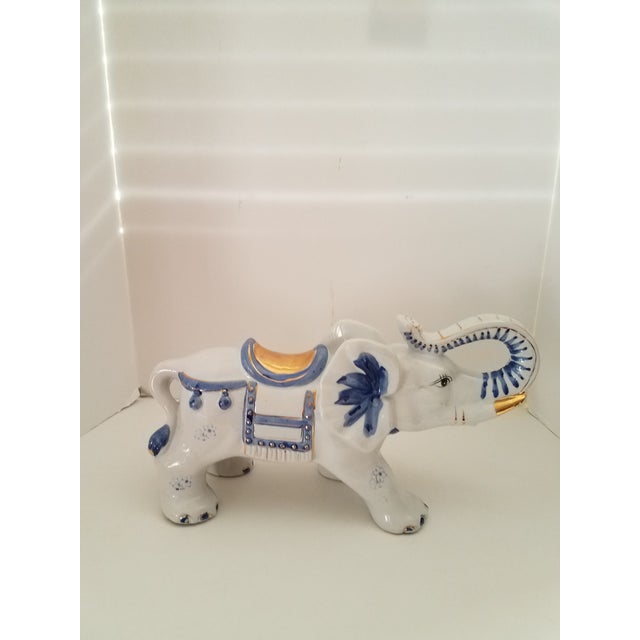 Vintage glazed ceramic hand painted blue & white chinoiserie elephants a pair. What unusual twin elephants these are. Hand...