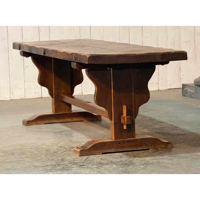 We are pleased to offer this wonderful Farmhouse Dining Table. Solid Oak and a thick 2 plank Top, also retaining its warm...