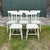 Classic sturdy plank seat oak grange chairs with early gray paint, from a grange in Maine. Note: Will split the set. #5718.