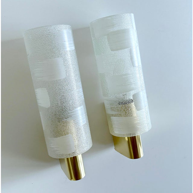 Pair of Vintage mid century sconces with frosted acrylic glass shades mounted on metal structure with brass cover...