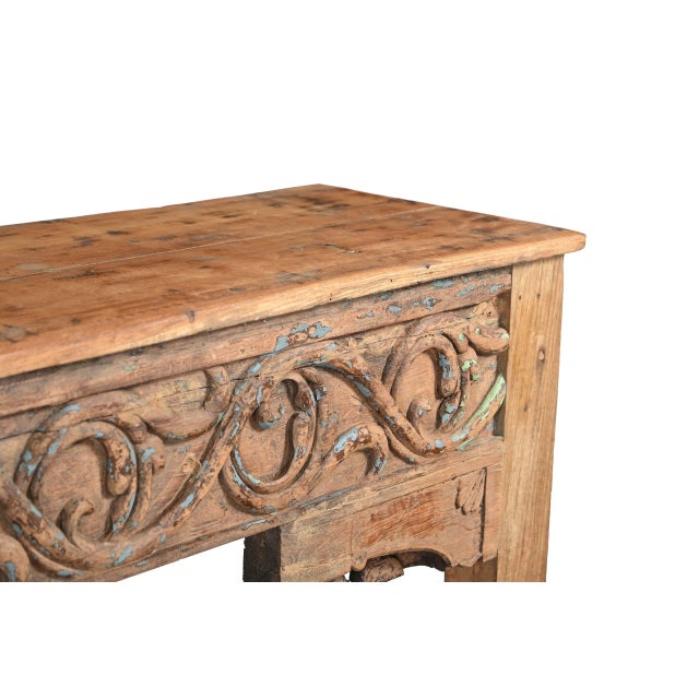 Indian Bleached Teakwood Console Table constructed from antique carvings and reclaimed wood, with bold relief carved...