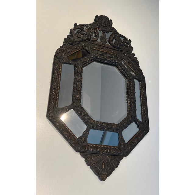 This beautiful and interesting closed-face mirror is made of mirrors and stainless steel elements. Embossed copper...