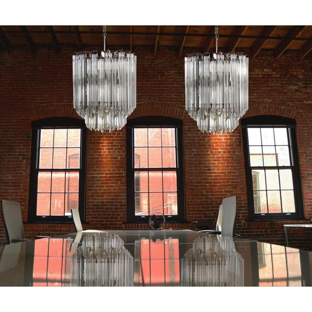 Fantastic vintage Murano chandelier made by 47 Murano transparent crystal prism "quadriedri" in a nickel metal frame. The...