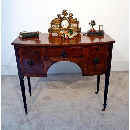 A handsome period Regency mahogany sideboard dating to 1810 Stamped Gillows on the top of the drawer The top has a gently...