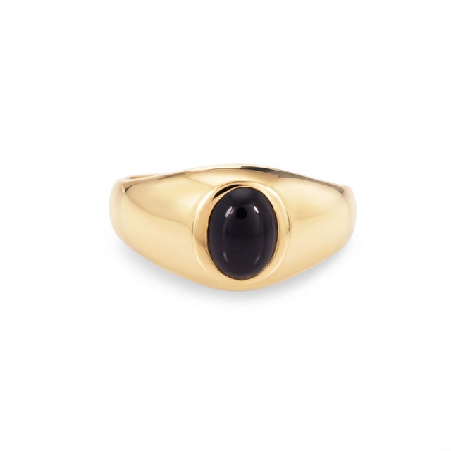 Stylish vintage black onyx ring crafted in 14k yellow gold (circa 1970s). Black onyx measures 8mm x 6mm. Minimal,...