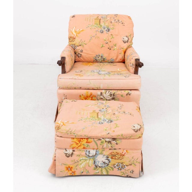 Peach Floral Print Upholstered Lounge Chair and Ottoman. 31" H x 28.5" W x 32" D; seat: 17" H. Provenance: From a...