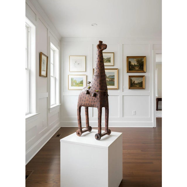 VERY RARE CARVED AND POLYCHROMED WOOD GIRAFFE PULL TOY Probably Pennsylvania, circa 1850-80 36 5/8" H x 10 1/4" D x 12...