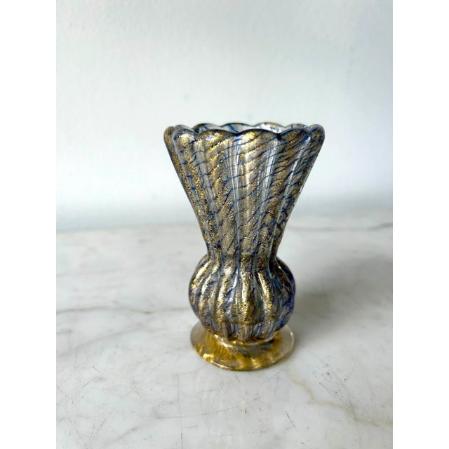 Designed by the renowned Italian glass master Ercole Barovier circa 1950, this vase can be directly attributed to Barovier...