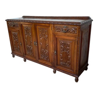 Early 20th Carved Walnut Sideboard With Four Doors and Two Drawers and Crest For Sale