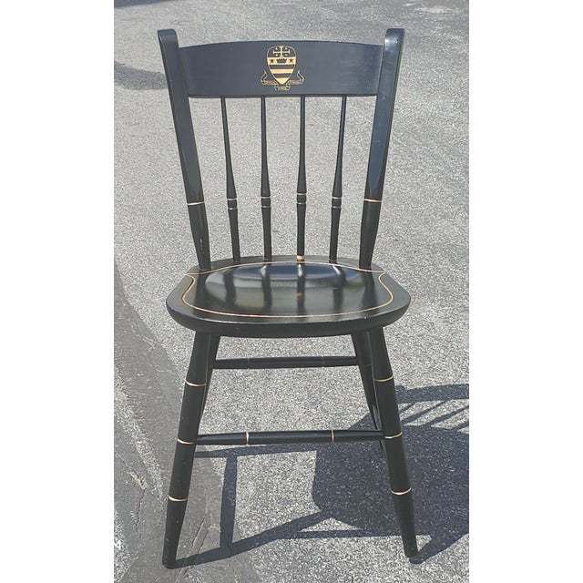 A late 20th Century Nichols & Stone National Cathedral School Ebonized and Gilt Windsor Chair in excellent vintage...